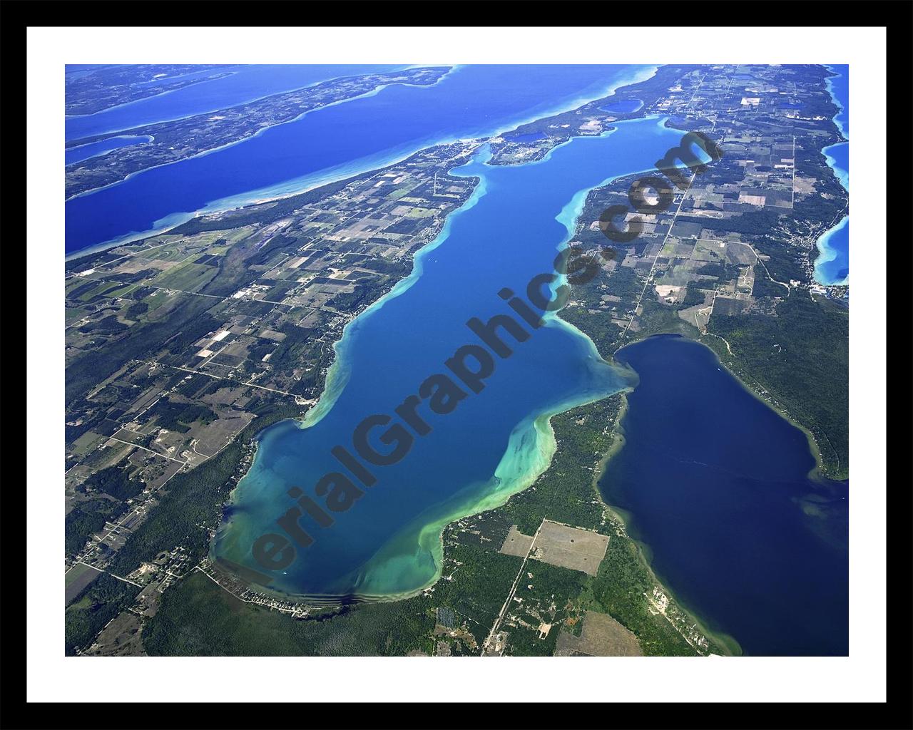 Aerial image of [4784] Elk Lake in Antrim, MI with Black Metal frame