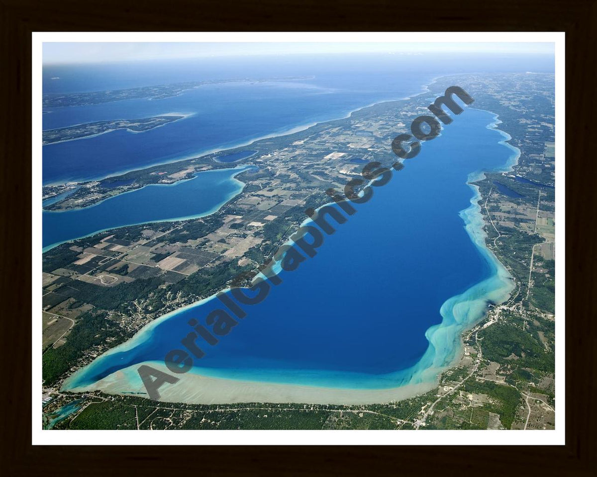 Aerial image of [4785] Torch Lake in Antrim, MI with Black Wood frame