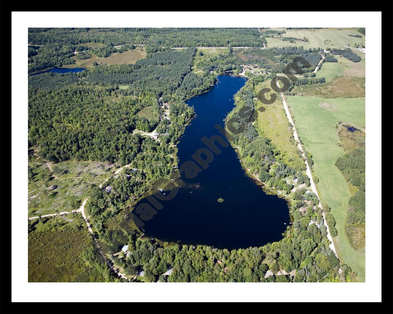 Aerial image of [4786] Little Long Lake in Osceola, MI with Black Metal frame