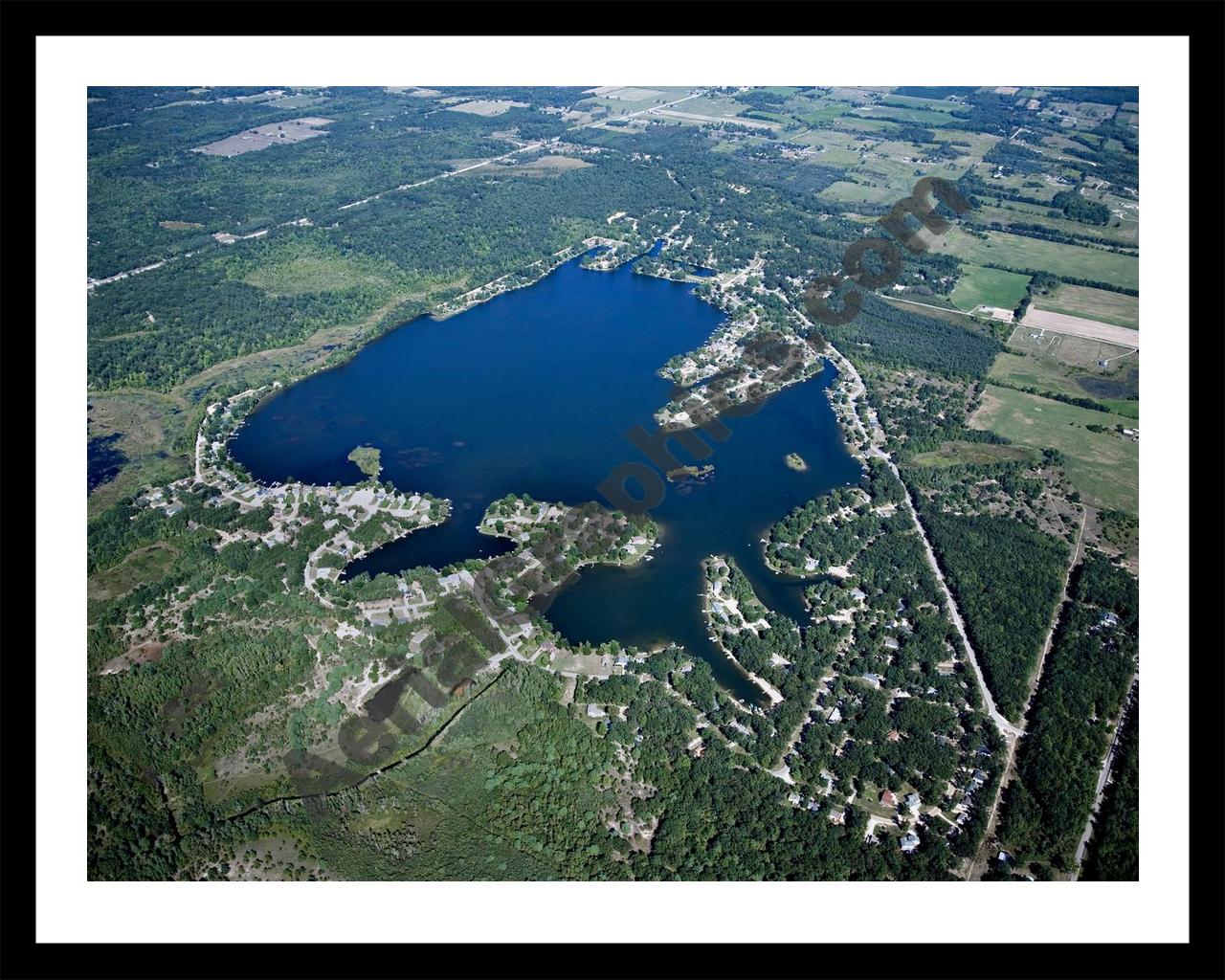 Aerial image of [4788] Indian Lake in Montcalm, MI with Black Metal frame