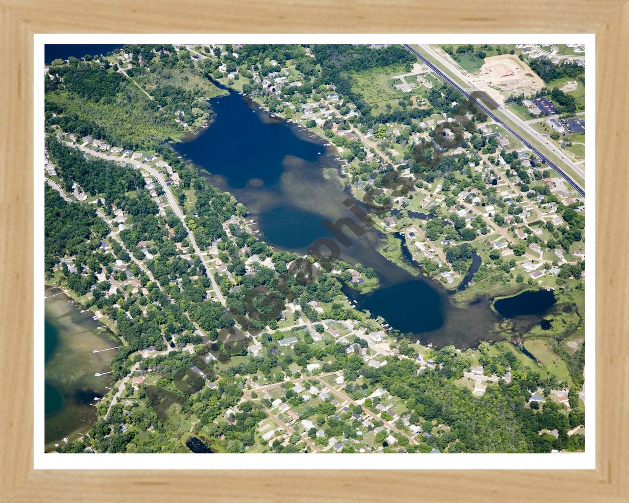 Aerial image of [4834] Handy Lake in Livingston, MI with Natural Wood frame