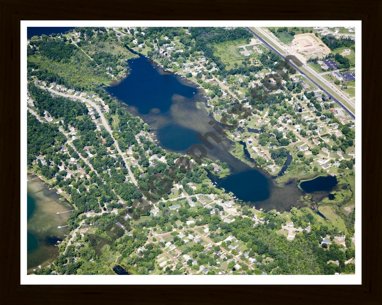 Aerial image of [4834] Handy Lake in Livingston, MI with Black Wood frame