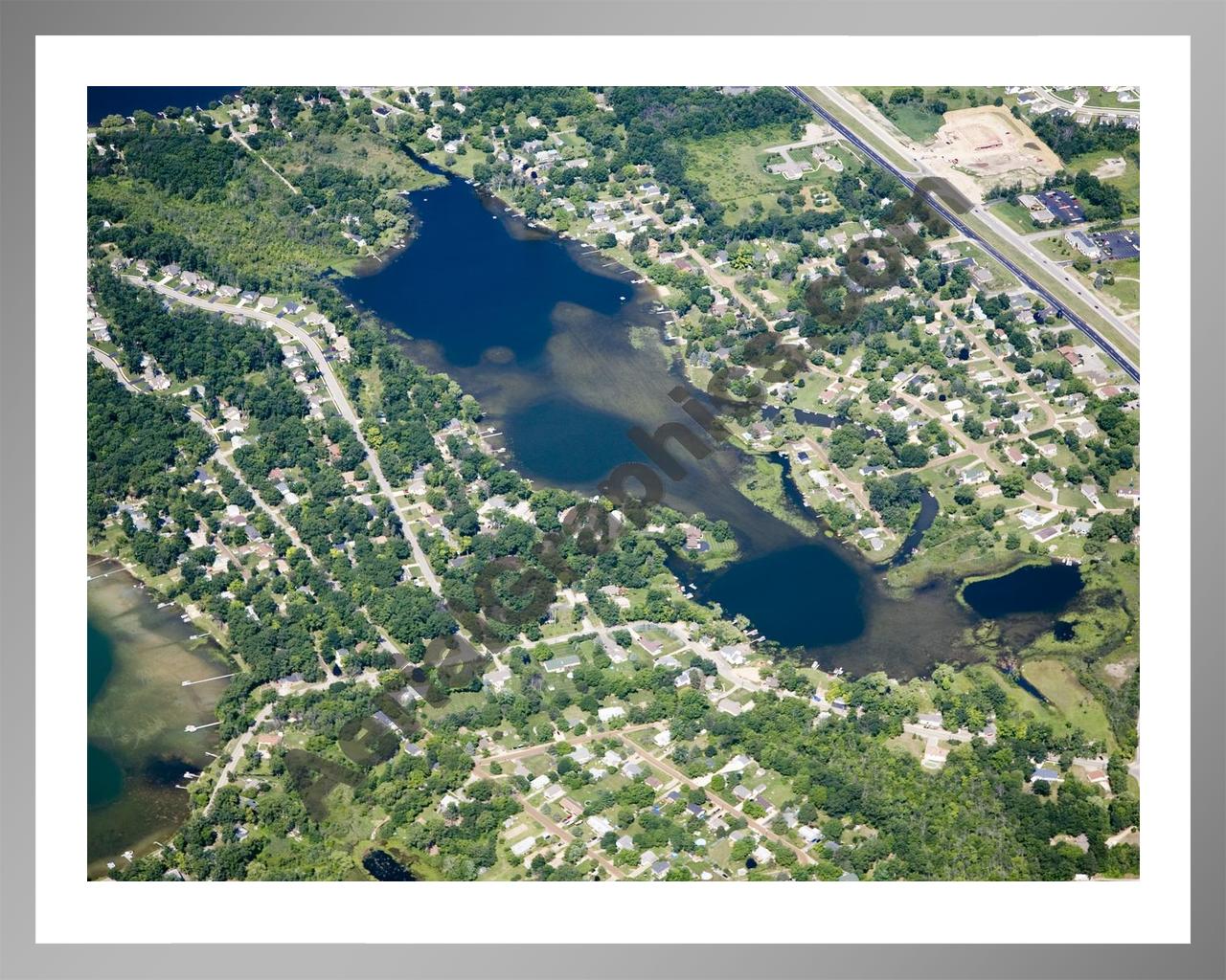 Aerial image of [4834] Handy Lake in Livingston, MI with Silver Metal frame