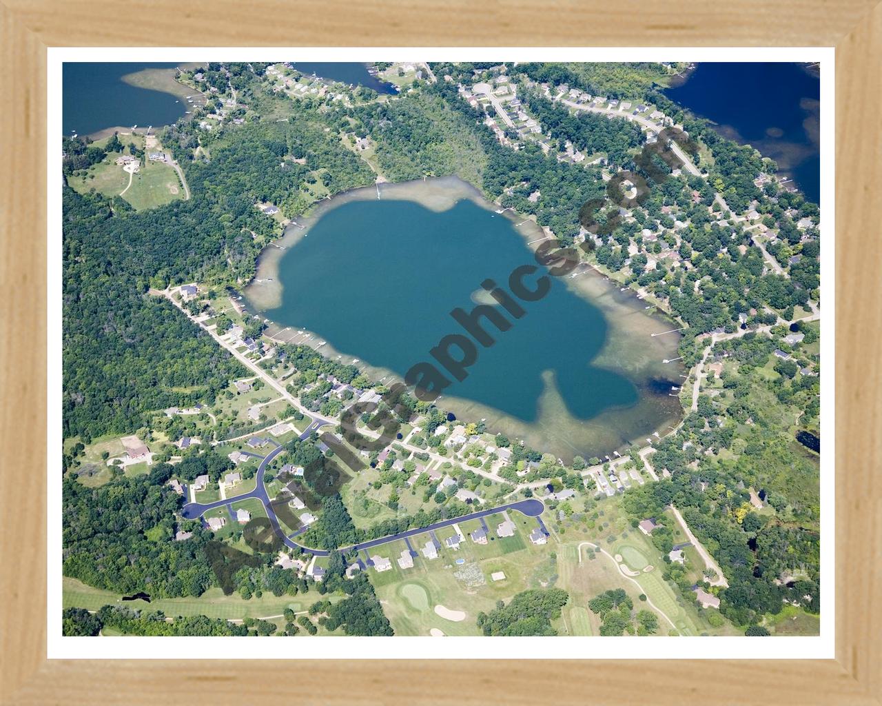 Aerial image of [4835] Maxfield Lake in Livingston, MI with Natural Wood frame