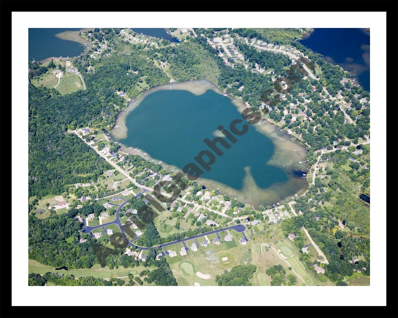 Aerial image of [4835] Maxfield Lake in Livingston, MI with Black Metal frame