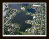 Aerial image of [4925] Rushmore Lake in Ottawa, MI with Black Wood frame