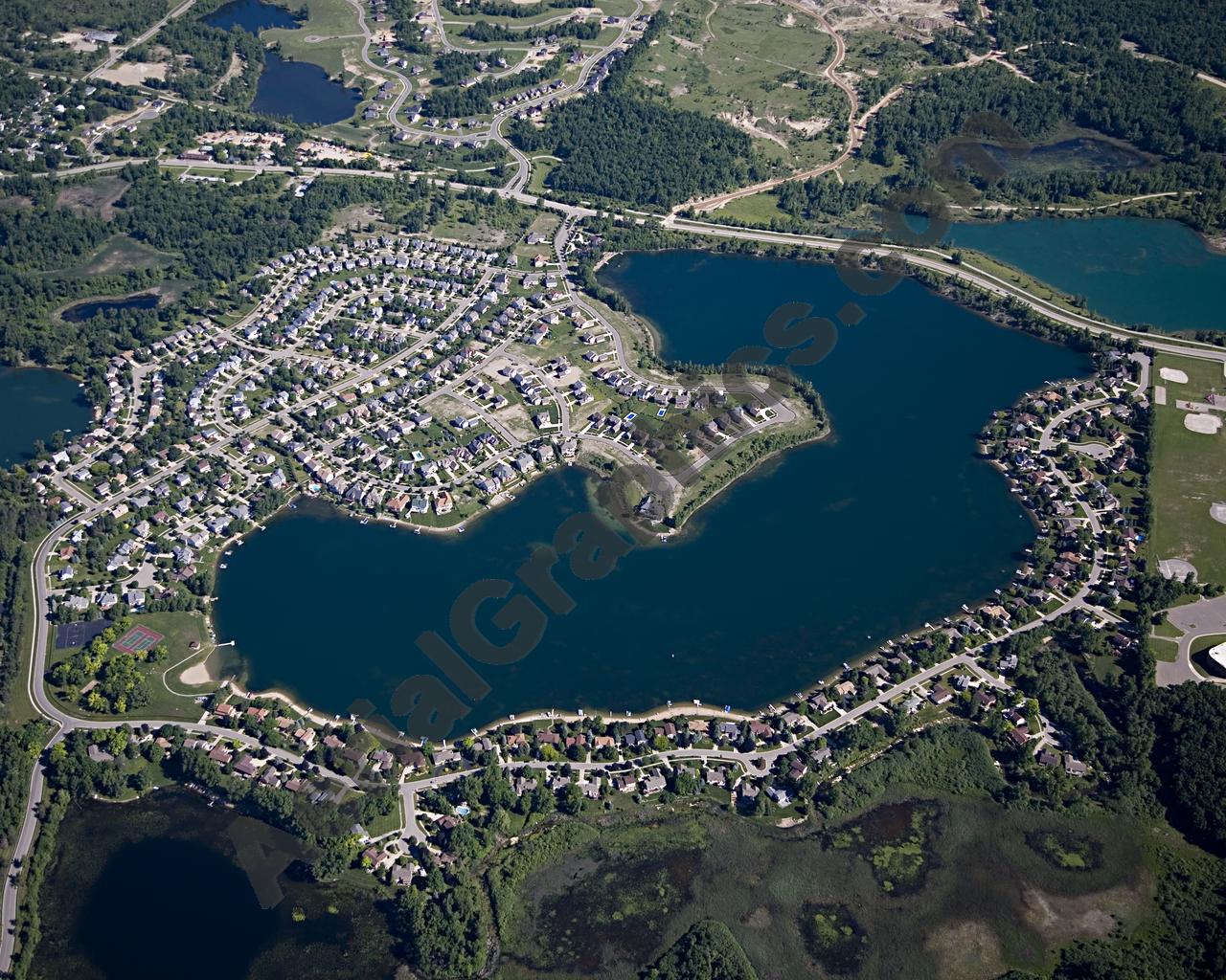 Aerial image of [4956] Oxford Lake in Oakland, MI with Canvas Wrap frame