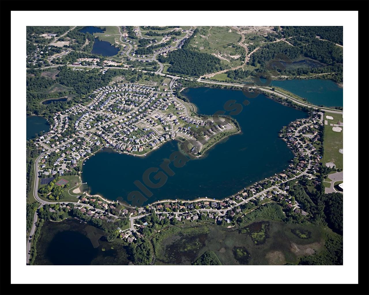 Aerial image of [4956] Oxford Lake in Oakland, MI with Black Metal frame