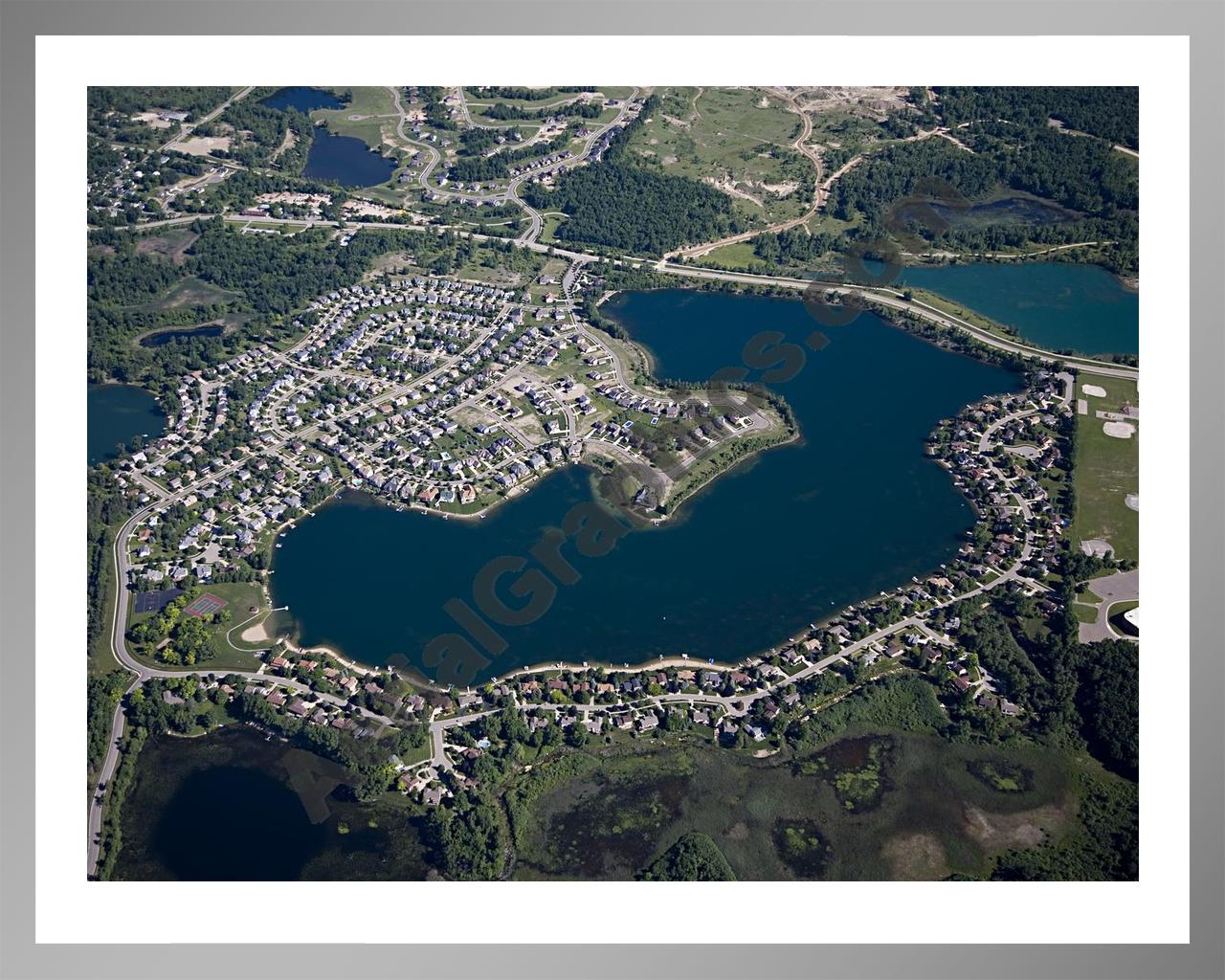 Aerial image of [4956] Oxford Lake in Oakland, MI with Silver Metal frame