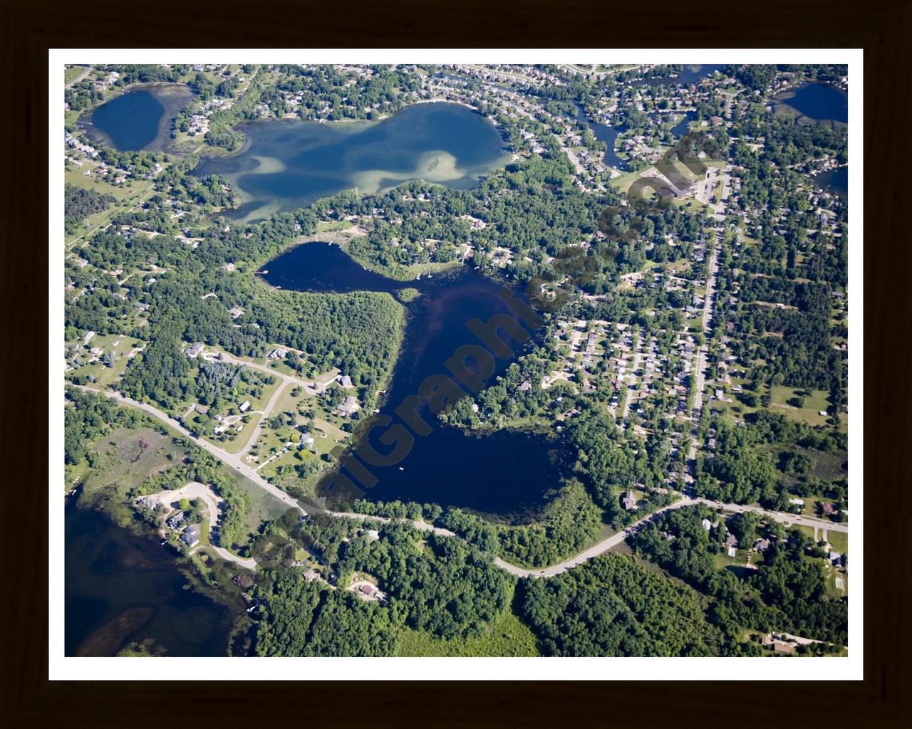 Aerial image of [4957] Elkhorn Lake in Oakland, MI with Black Wood frame