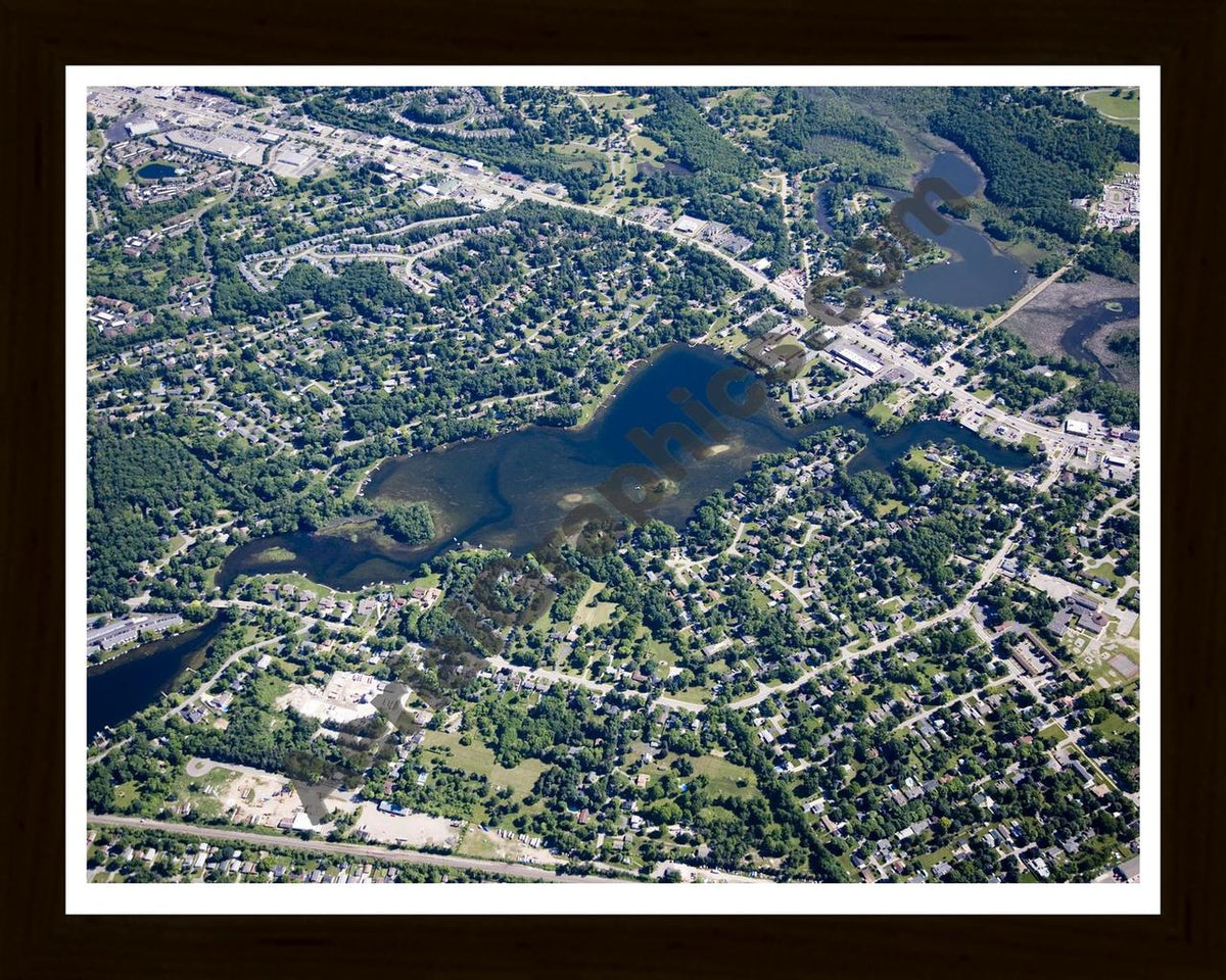 Aerial image of [4964] Van Norman Lake in Oakland, MI with Black Wood frame