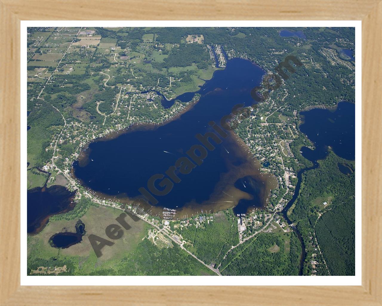 Aerial image of [4976] Portage Lake in Livingston, MI with Natural Wood frame