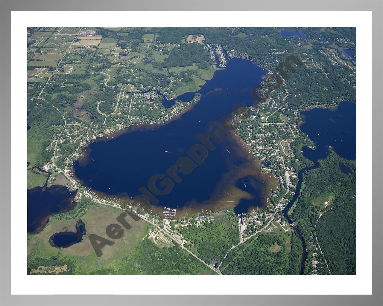 Aerial image of [4976] Portage Lake in Livingston, MI with Silver Metal frame