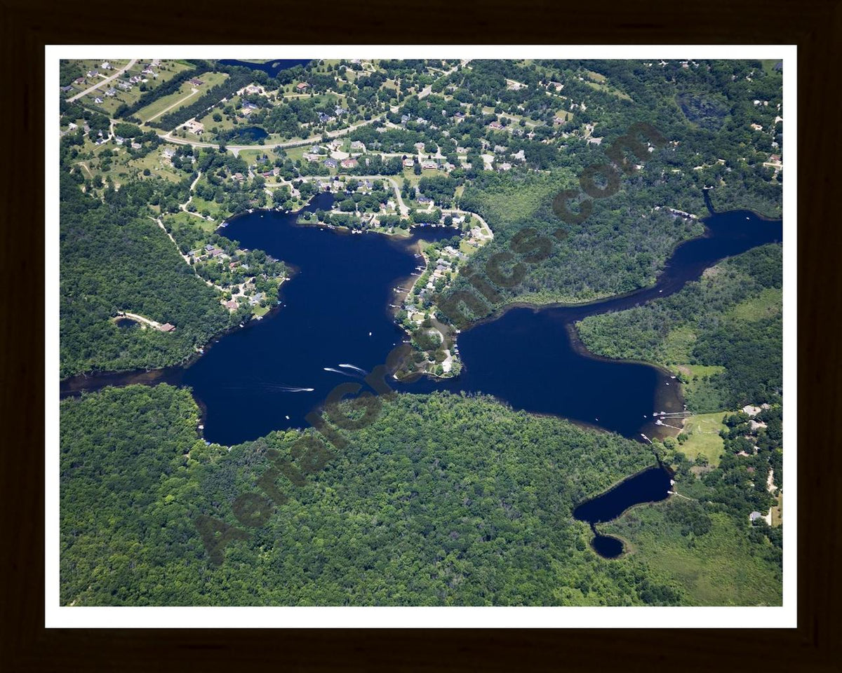Aerial image of [4979] Whitewood (Gallagher) Lakes in Livingston, MI with Black Wood frame