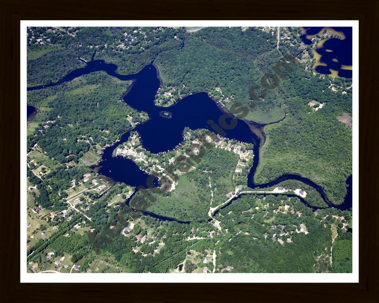 Aerial image of [4980] Gallagher Lake in Livingston, MI with Black Wood frame