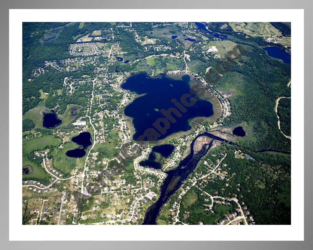 Aerial image of [4985] Ore Lake in Livingston, MI with Silver Metal frame