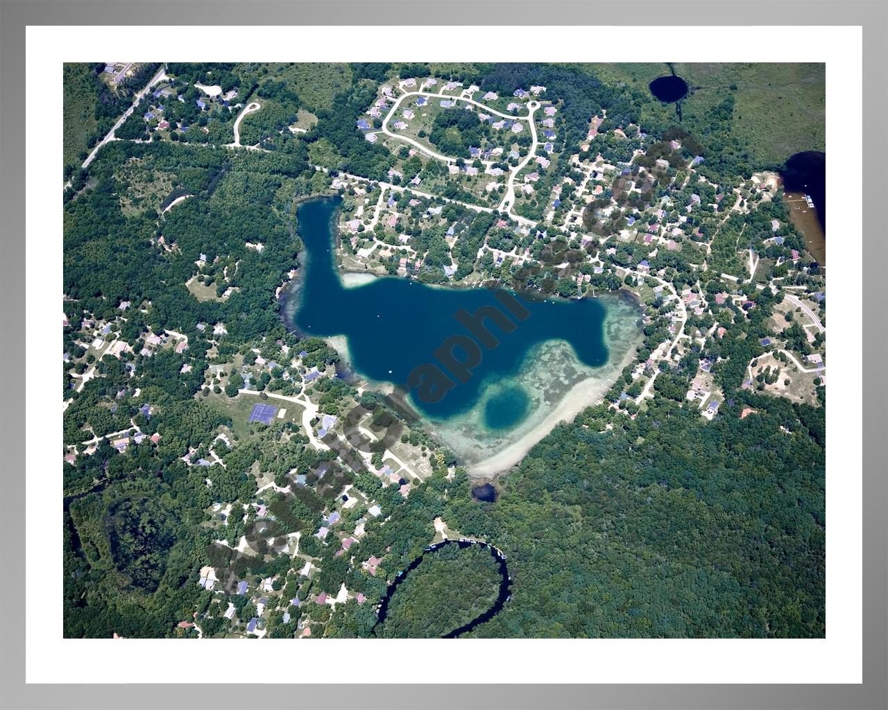 Aerial image of [4988] Cordley Lake in Livingston, MI with Silver Metal frame