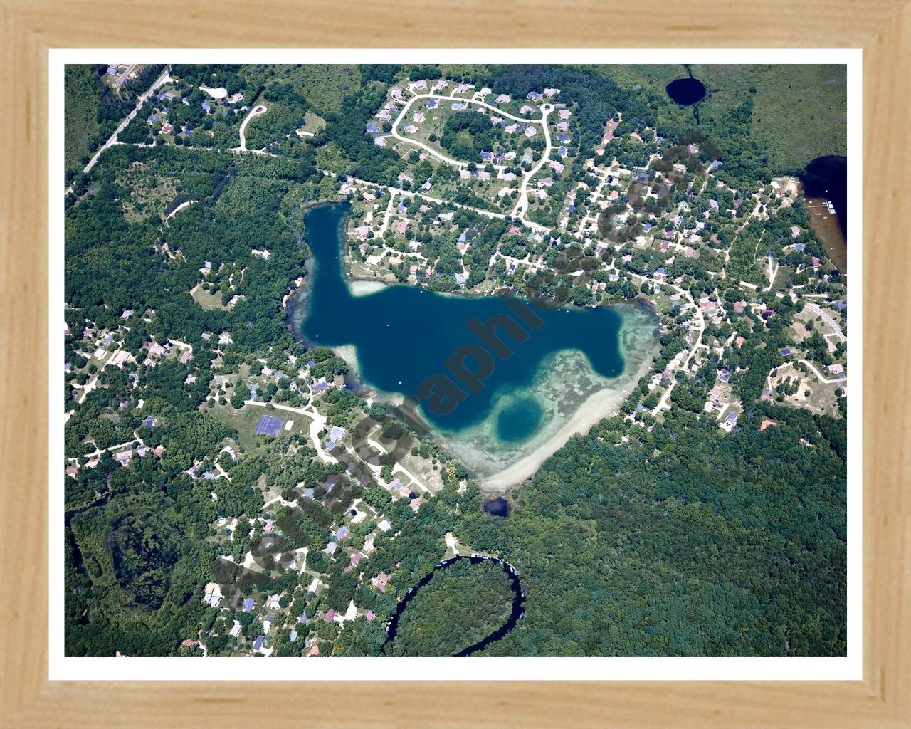 Aerial image of [4988] Cordley Lake in Livingston, MI with Natural Wood frame