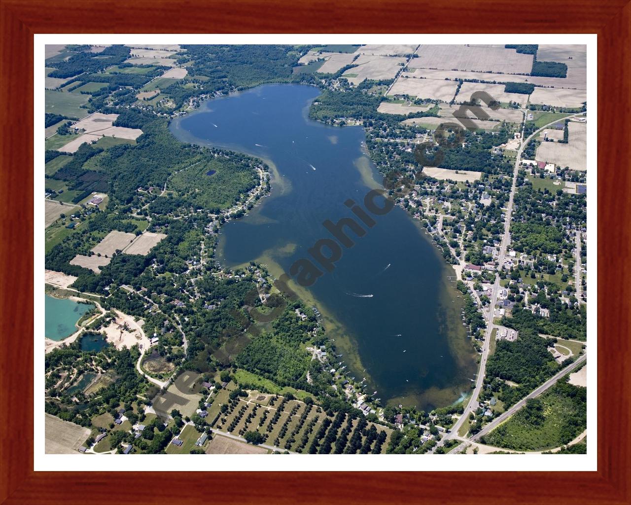 Aerial image of [4994] Jordan Lake in Ionia, MI with Cherry Wood frame