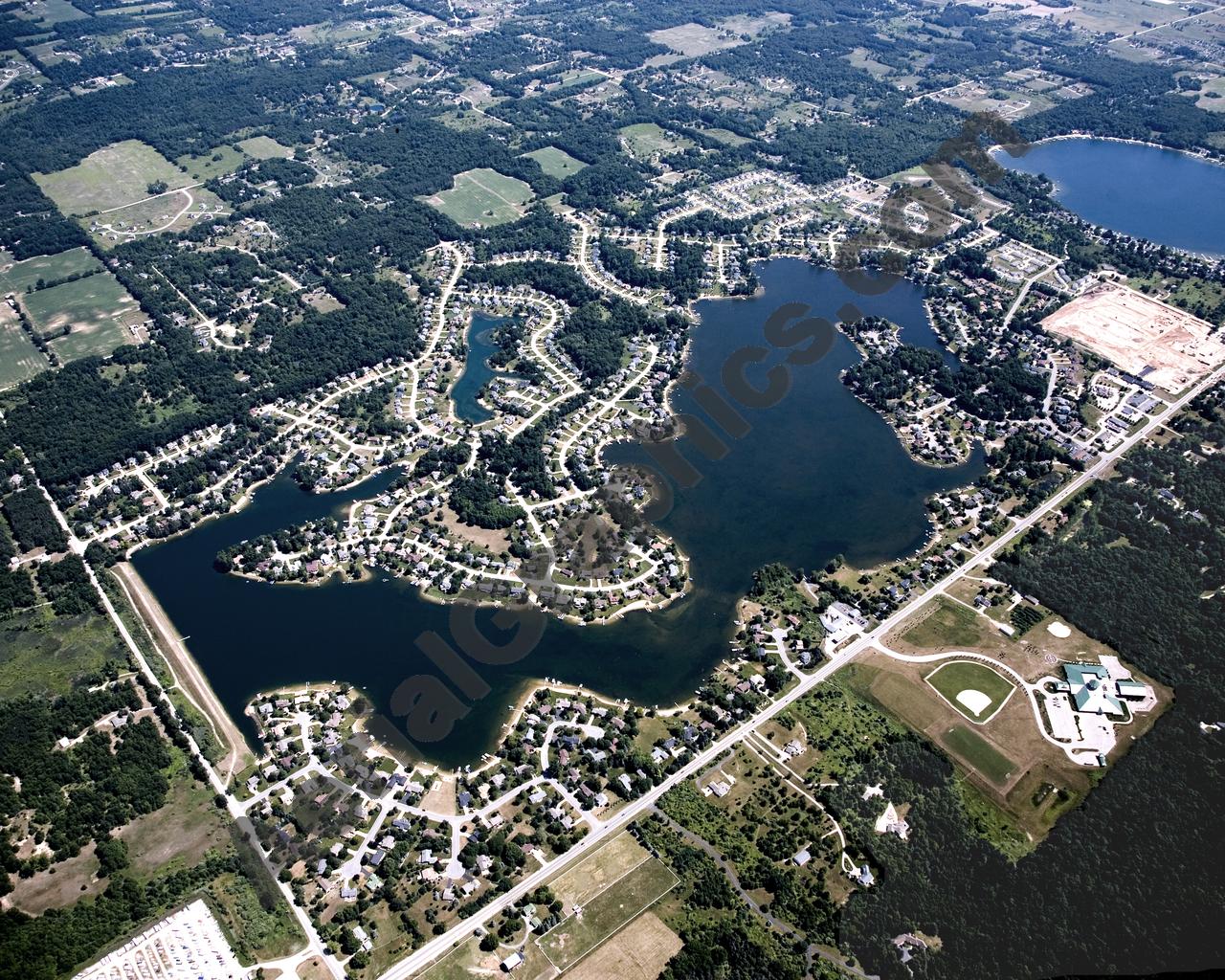 Aerial image of [4998] Lake Bella Vista in Kent, MI with Canvas Wrap frame