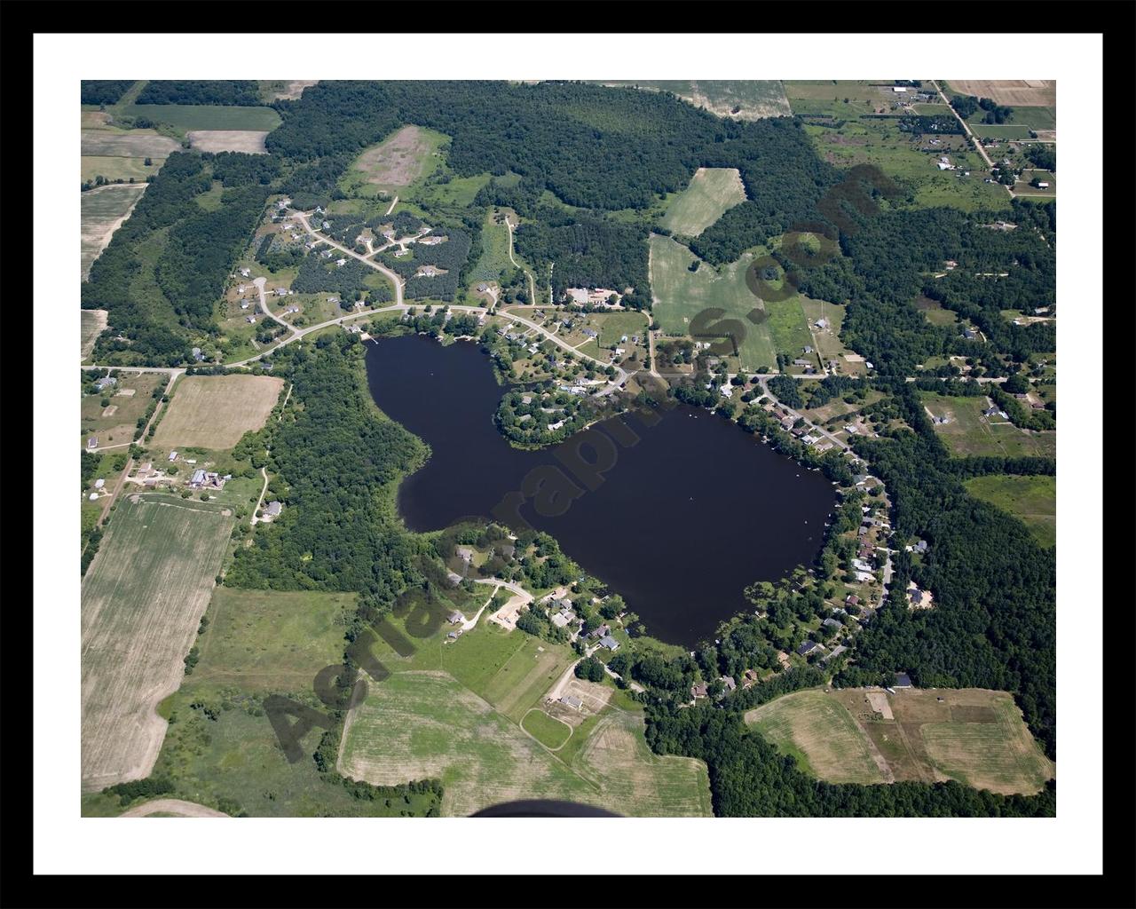 Aerial image of [5001] Cowan Lake in Kent, MI with Black Metal frame