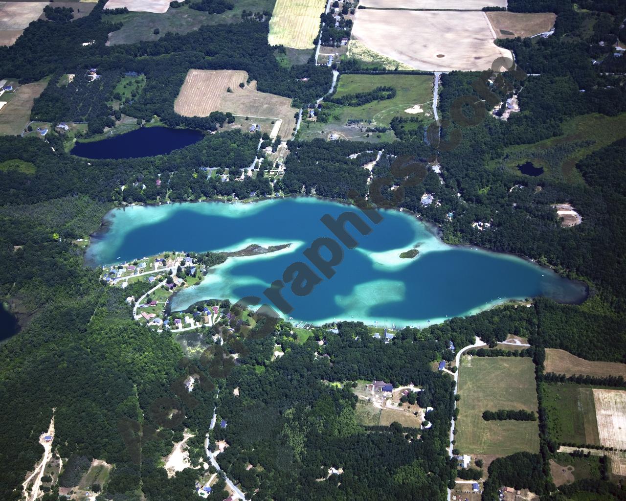 Aerial image of [5010] Burgess Lake in Montcalm, MI with Canvas Wrap frame