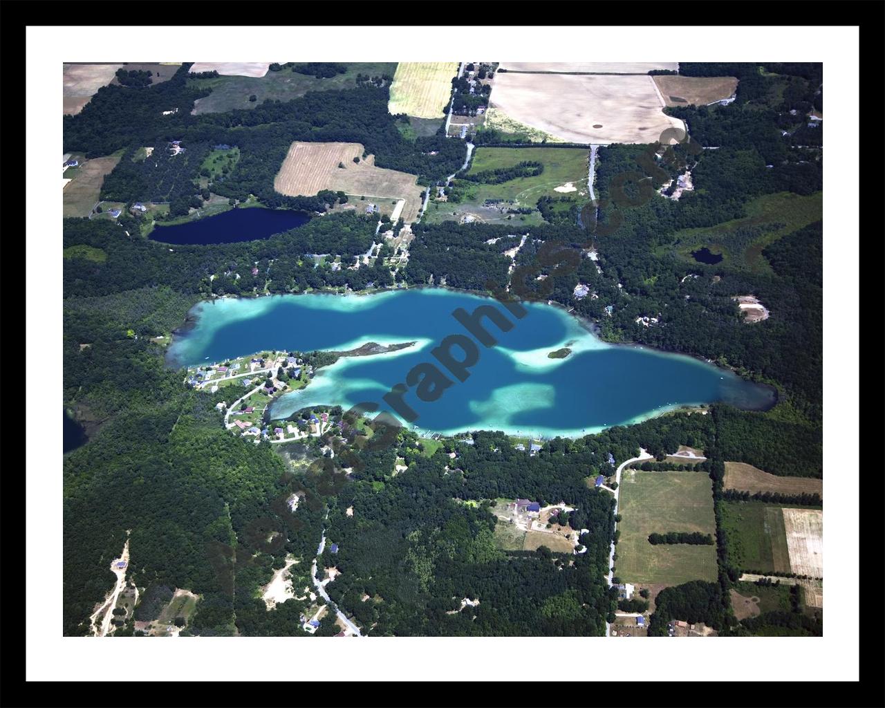 Aerial image of [5010] Burgess Lake in Montcalm, MI with Black Metal frame