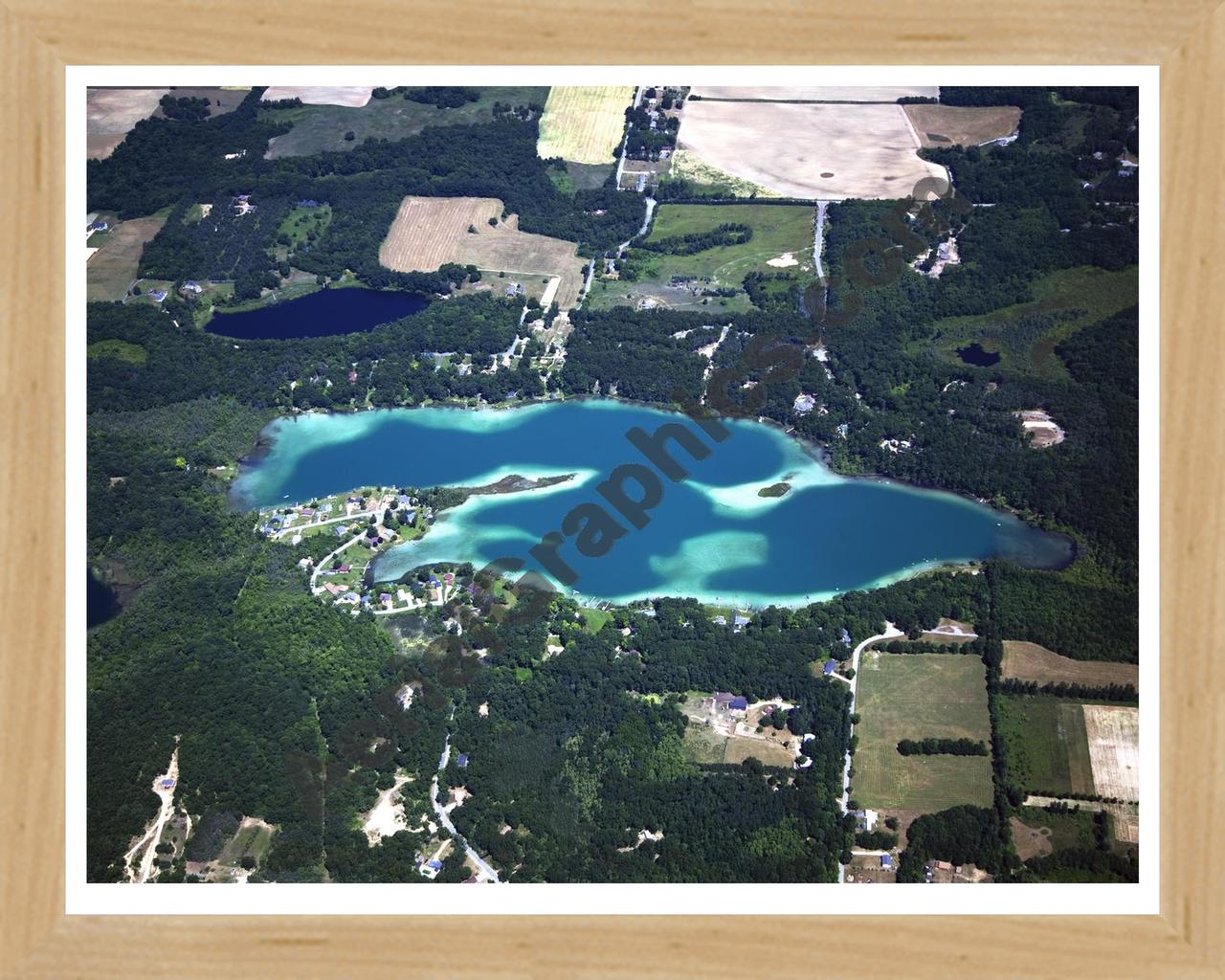 Aerial image of [5010] Burgess Lake in Montcalm, MI with Natural Wood frame