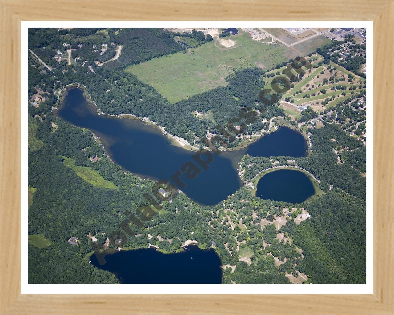 Aerial image of [5011] Baldwin Lake in Montcalm, MI with Natural Wood frame