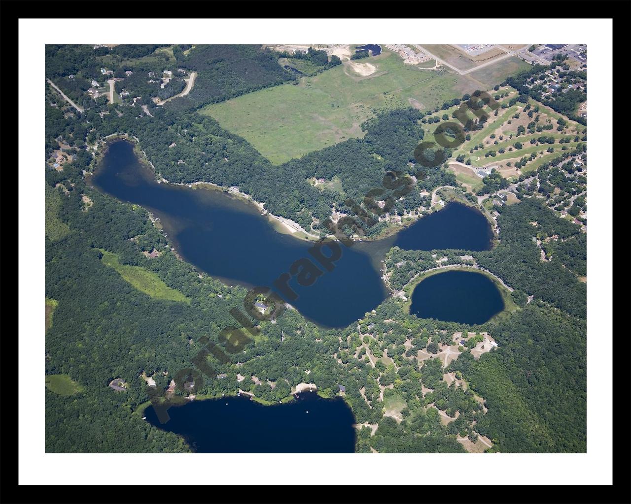 Aerial image of [5011] Baldwin Lake in Montcalm, MI with Black Metal frame