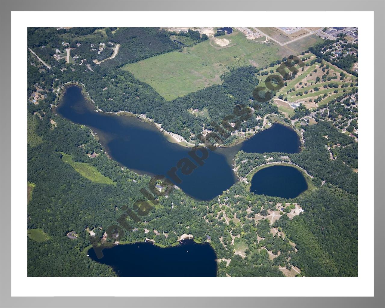 Aerial image of [5011] Baldwin Lake in Montcalm, MI with Silver Metal frame