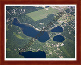 Aerial image of [5011] Baldwin Lake in Montcalm, MI with Cherry Wood frame