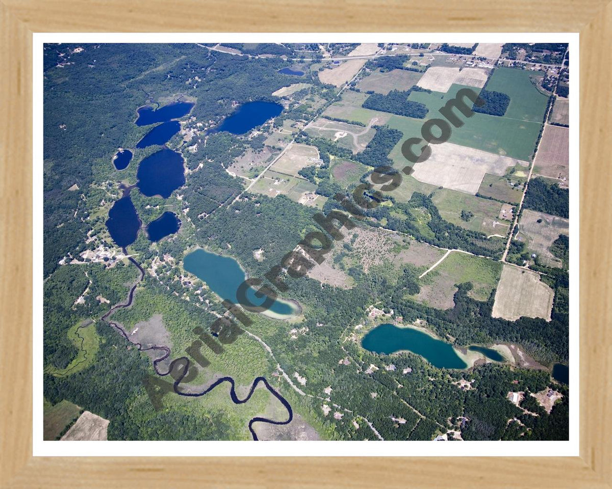 Aerial image of [5012] Morgan & Chain Lakes in Kent, MI with Natural Wood frame