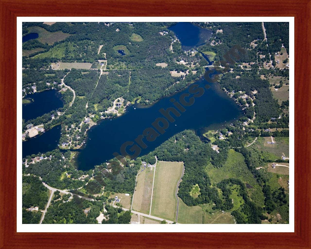 Aerial image of [5014] Woodbeck Lake in Kent, MI with Cherry Wood frame