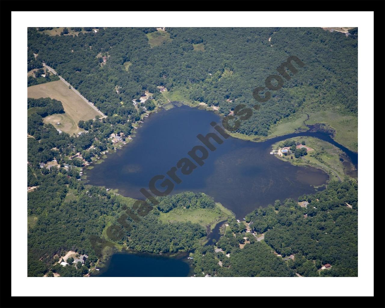 Aerial image of [5017] Thomas Lake in Kent, MI with Black Metal frame