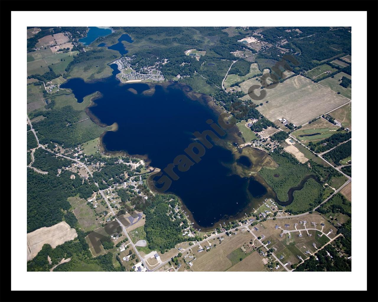 Aerial image of [5018] Lincoln Lake in Kent, MI with Black Metal frame