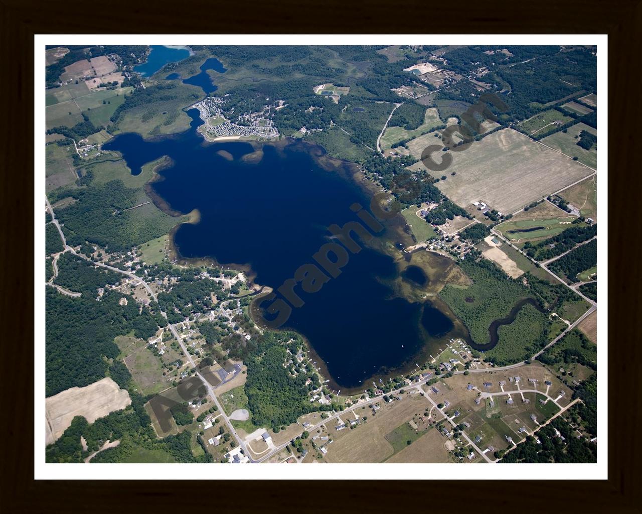 Aerial image of [5018] Lincoln Lake in Kent, MI with Black Wood frame