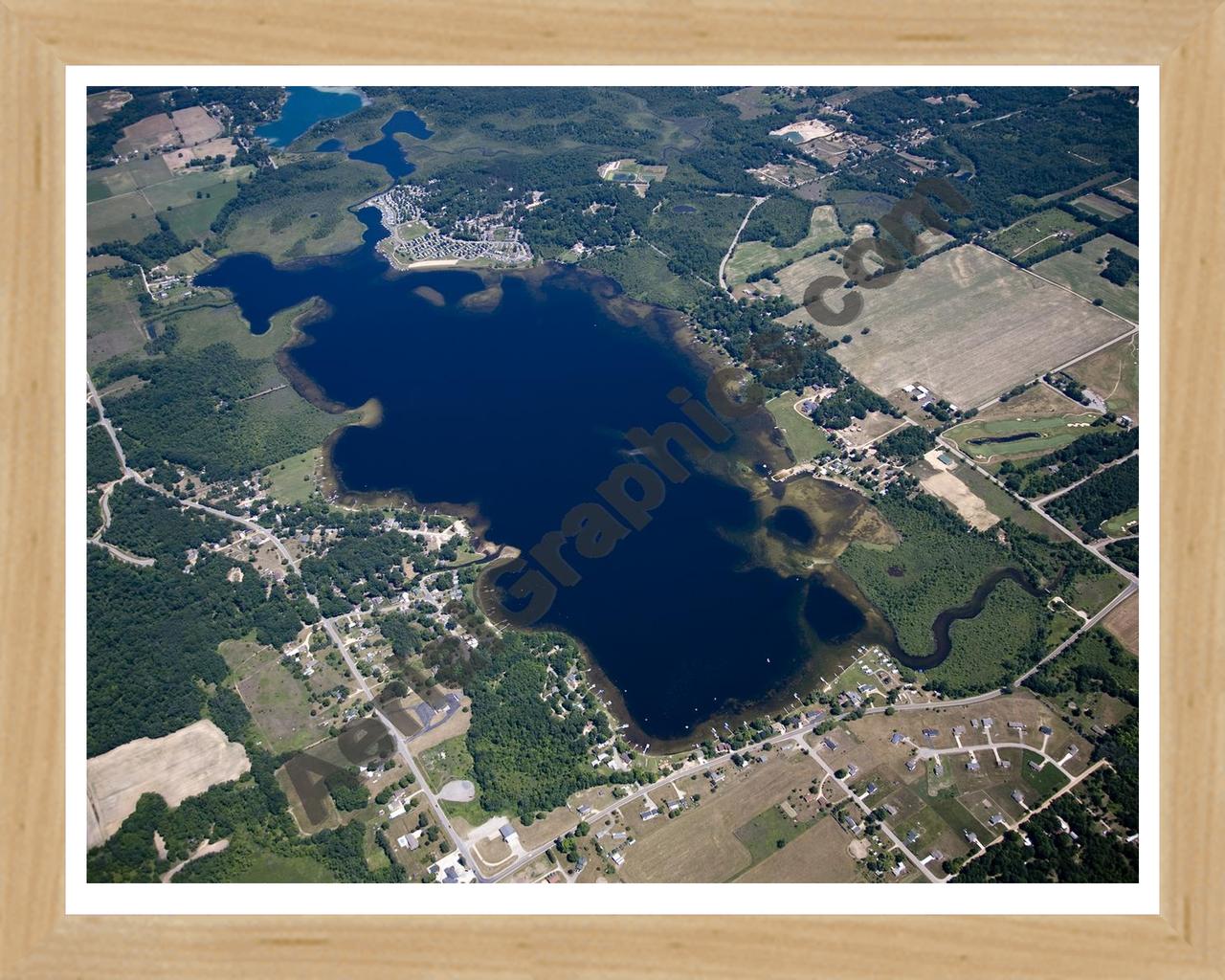 Aerial image of [5018] Lincoln Lake in Kent, MI with Natural Wood frame