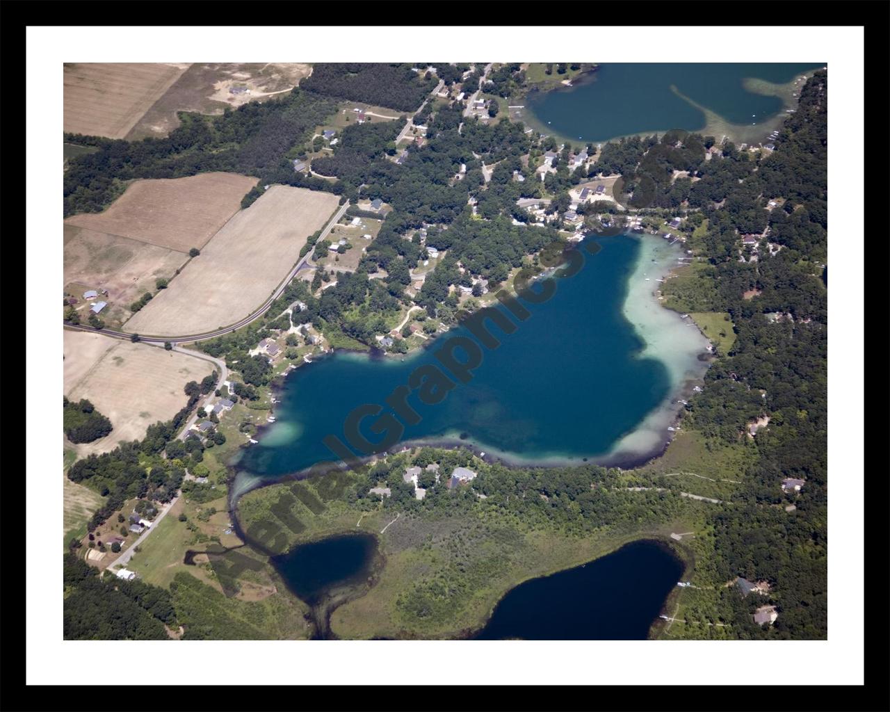 Aerial image of [5019] Blue Lake in Kent, MI with Black Metal frame