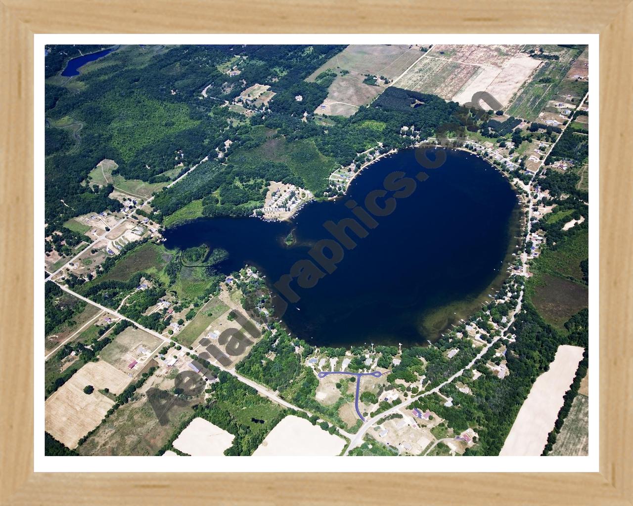 Aerial image of [5021] Bass Lake in Montcalm, MI with Natural Wood frame