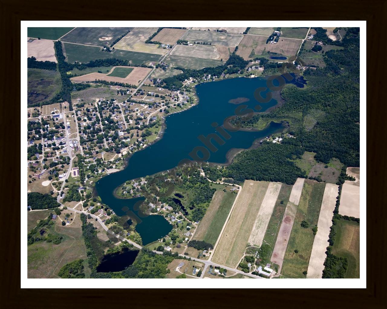 Aerial image of [5022] Muskellunge Lake in Montcalm, MI with Black Wood frame