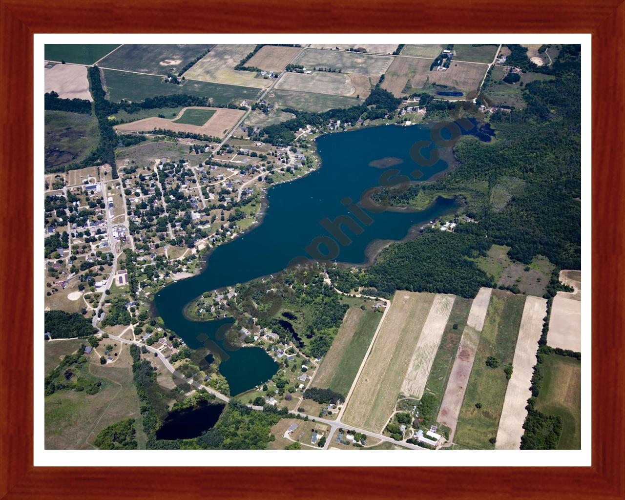 Aerial image of [5022] Muskellunge Lake in Montcalm, MI with Cherry Wood frame