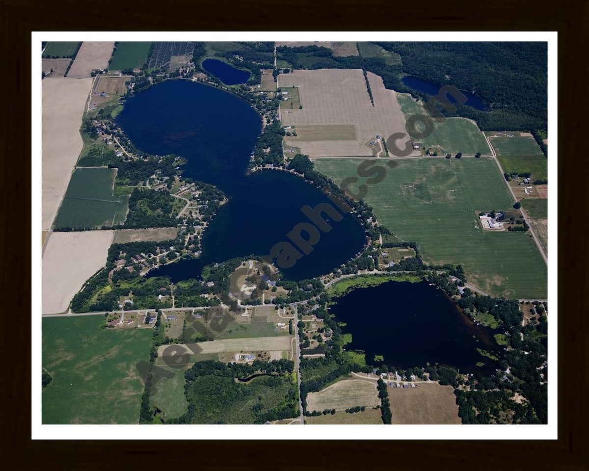 Aerial image of [5023] Rainbow Lake and Middle Lake in Montcalm, MI with Black Wood frame