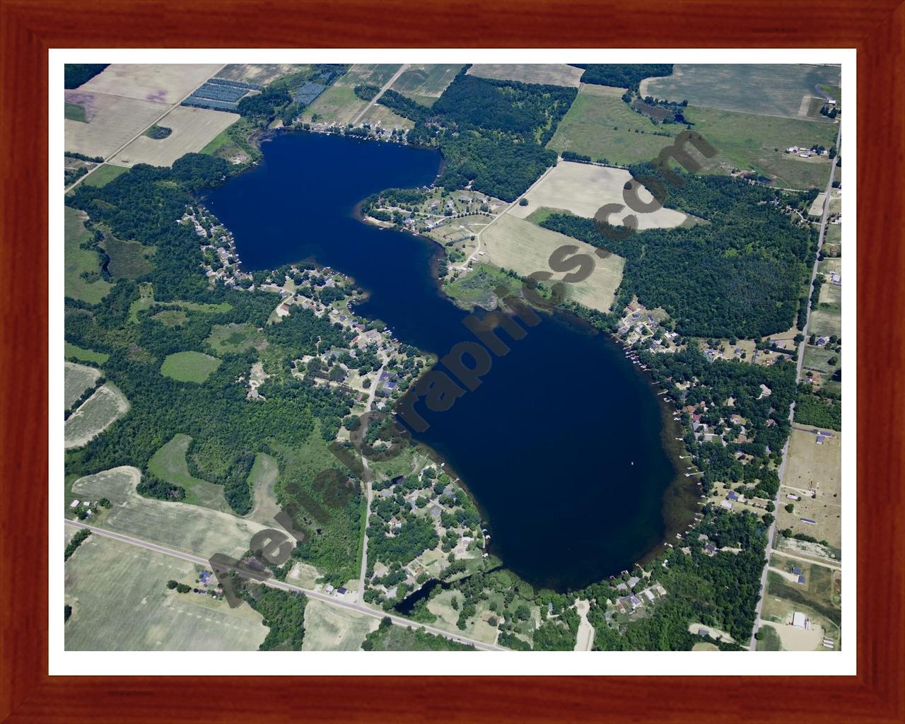 Aerial image of [5025] Clifford Lake in Montcalm, MI with Cherry Wood frame