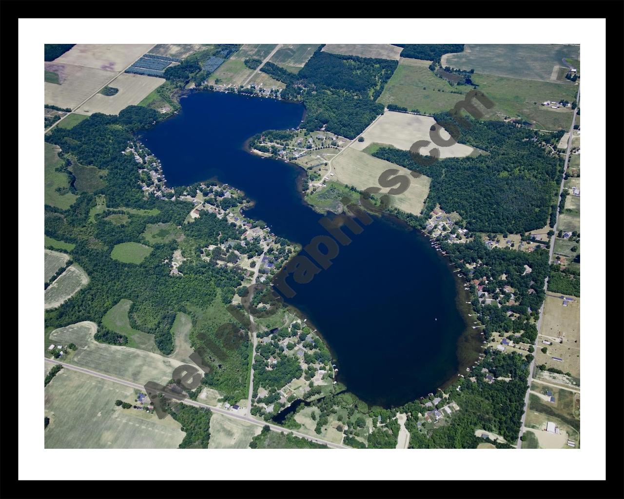 Aerial image of [5025] Clifford Lake in Montcalm, MI with Black Metal frame