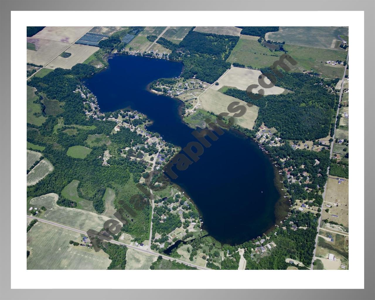 Aerial image of [5025] Clifford Lake in Montcalm, MI with Silver Metal frame