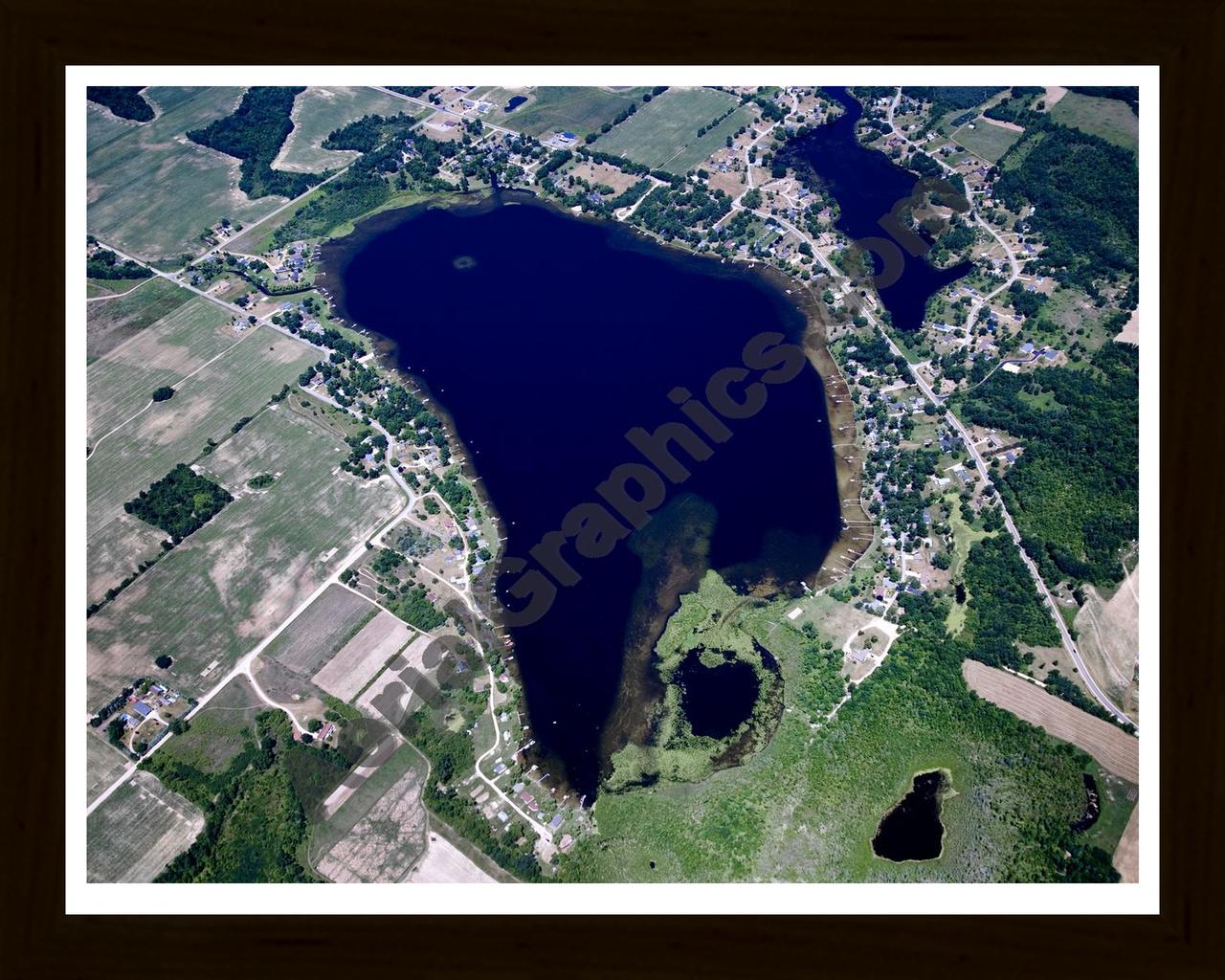 Aerial image of [5027] Dickerson Lake in Montcalm, MI with Black Wood frame