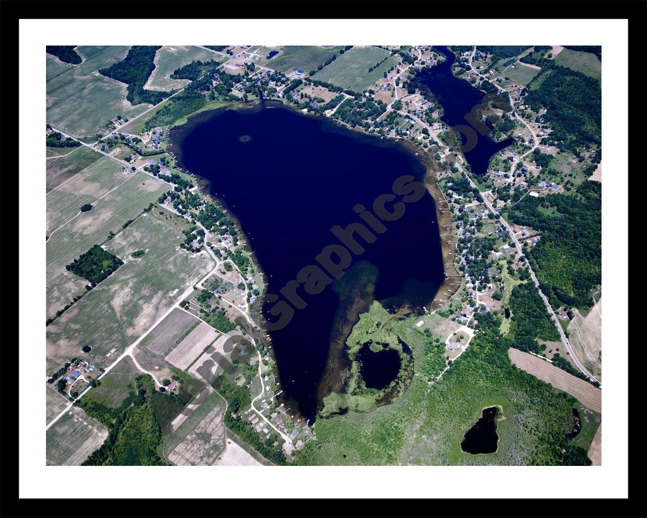 Aerial image of [5027] Dickerson Lake in Montcalm, MI with Black Metal frame