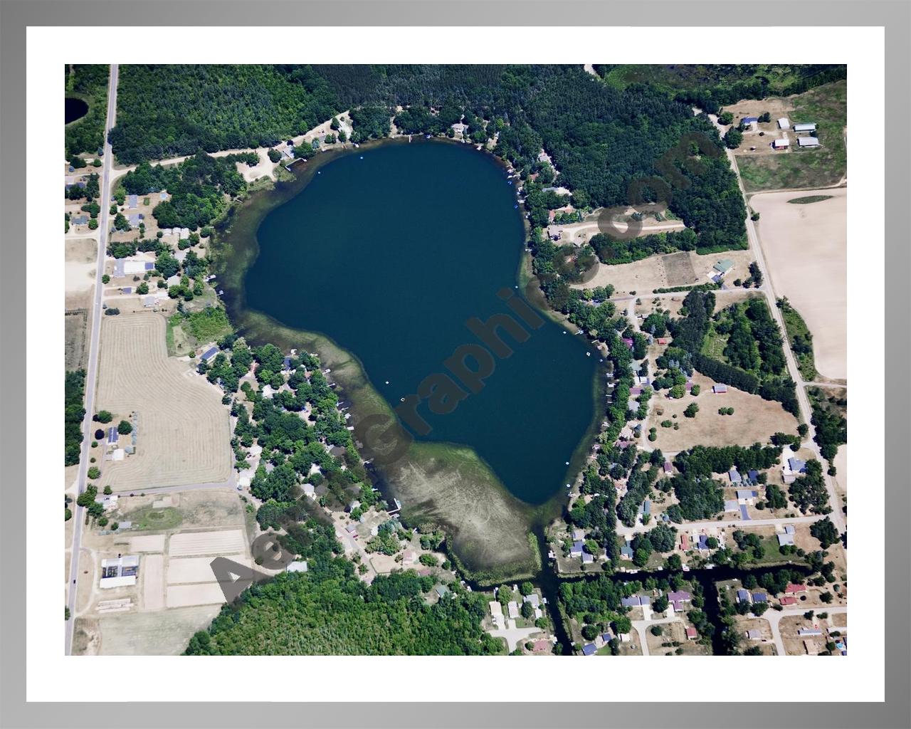 Aerial image of [5028] Nevins Lake in Montcalm, MI with Silver Metal frame