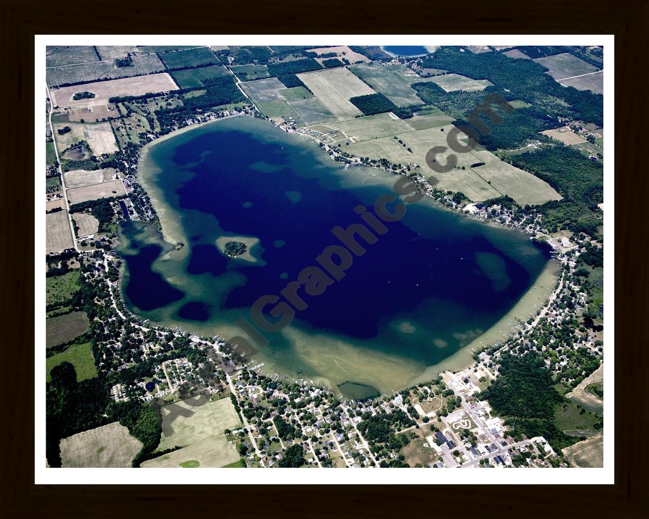 Aerial image of [5030] Crystal Lake in Montcalm, MI with Black Wood frame